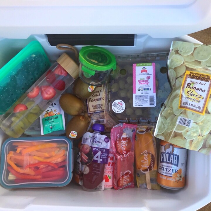 Overhead shot of a beach cooler filled with food