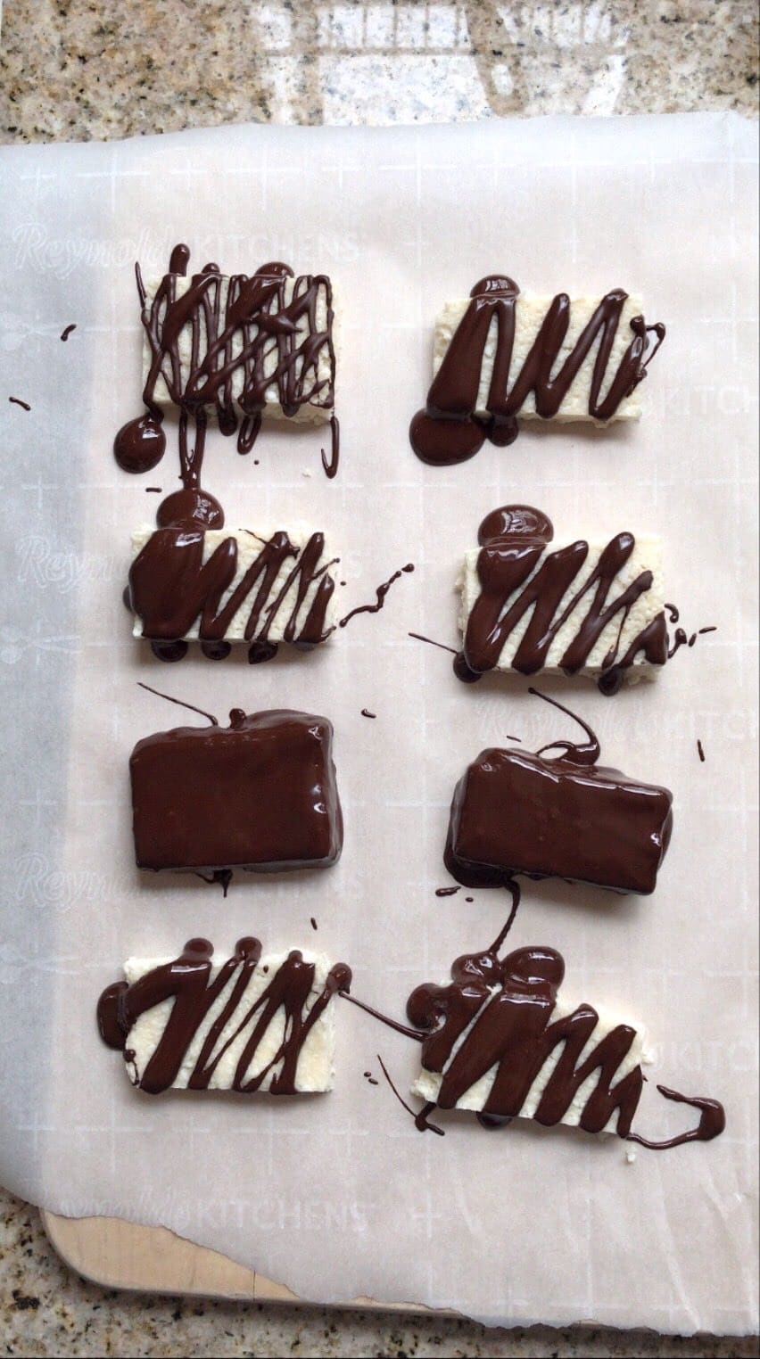 Overhead shot of Mounds Bars with fresh Chocolate Drizzle