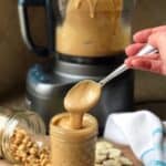 Homemade Banana Peanut Butter getting scooped with a spoon