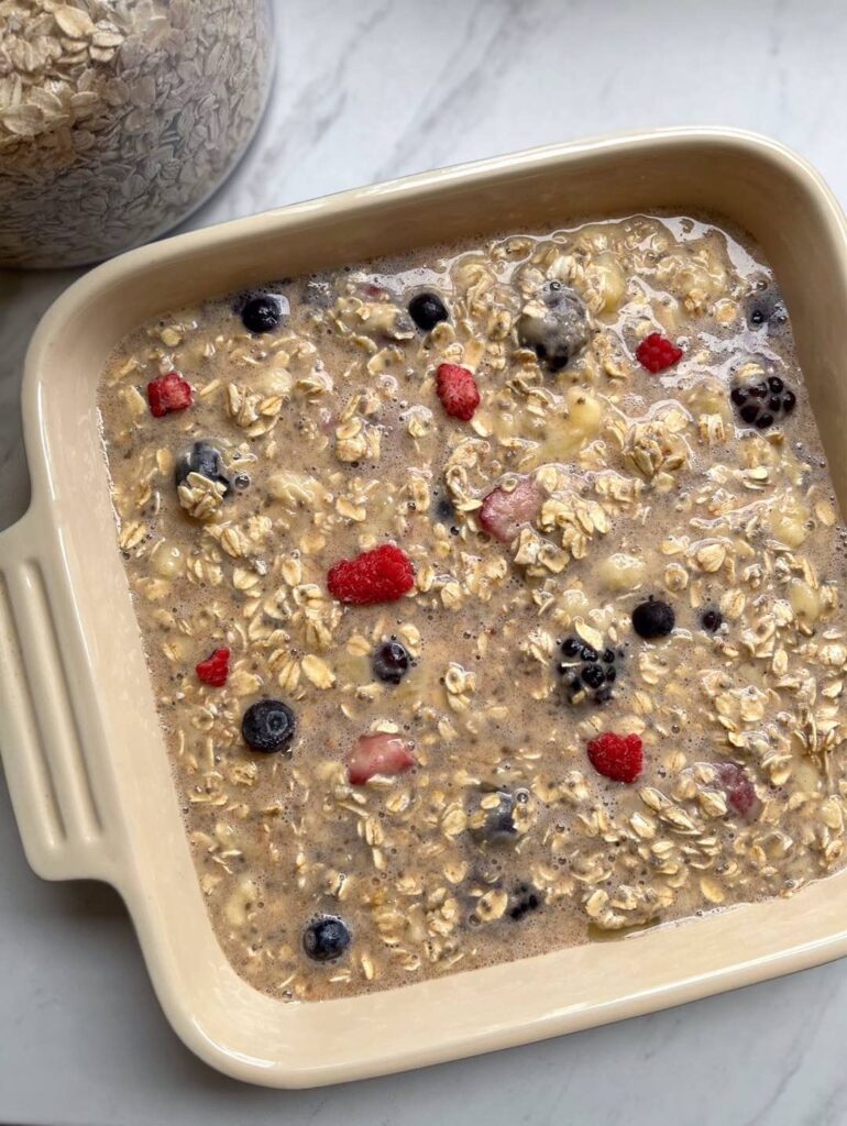 Overhead shot of unbaked Berry-Chia Baked Oatmeal